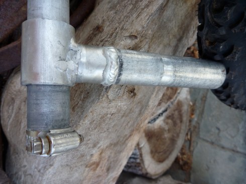 Leaving the tubes free spinning allows for easier attachment by person using the wheelchair. Notice the weld ring on the attachment tube, this accident created a nice stopping mark, keeping the tube from sliding to far into the attachment tube on the wheelchair.